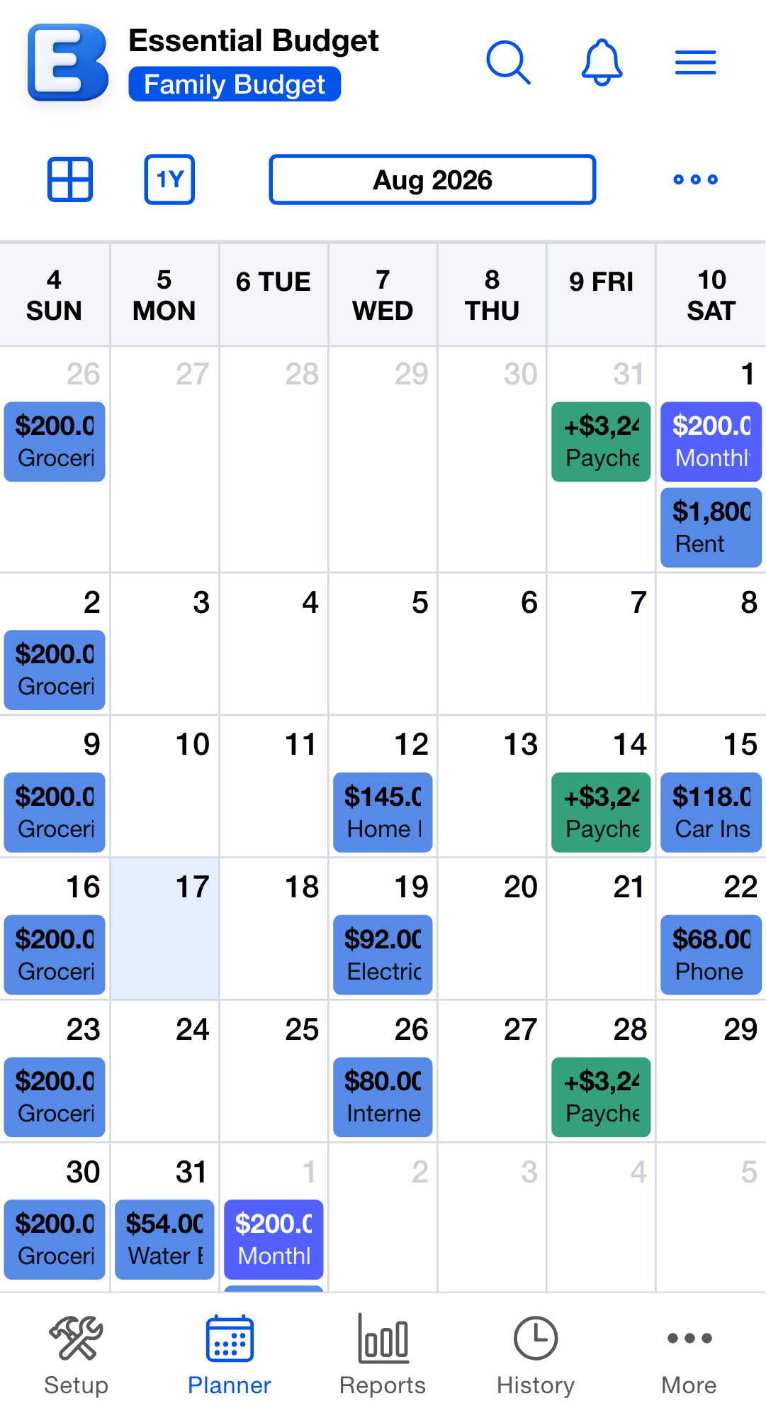 Planner Calendar view in Month layout for May 2026. Each day cell shows up to five event tiles, color-coded by category. Days with more events show a "+2 more" indicator in the corner. The 1st of the month has a Rent tile and a Spotify...